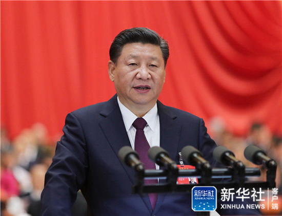 2017年10月18日，习近平在中国共产党第十九次全国代表大会上作报告。新华社记者 鞠鹏/摄