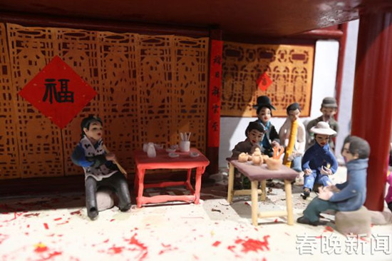 长达18米的大型千人面塑 还原云南人古风遗俗 长达18米的大型千人面塑 还原云南人古风遗俗