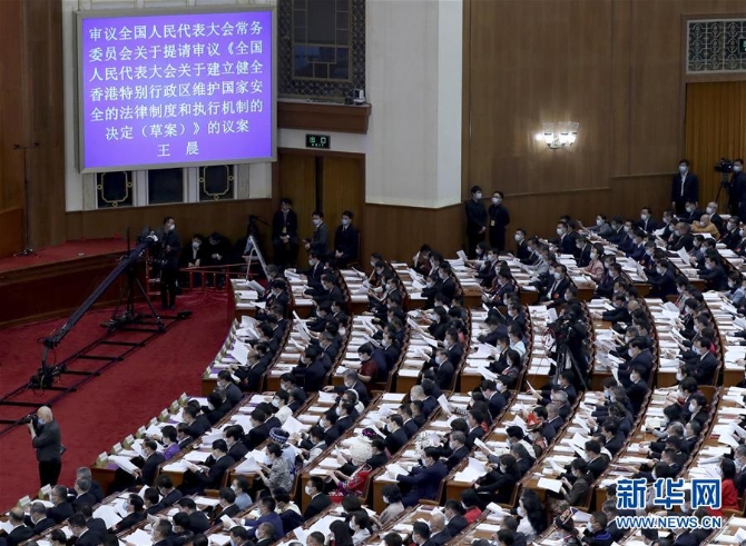 (新华全媒头条·两会特别报道·图文互动)(5)凝聚起决战决胜的人民伟力——2020年全国两会巡礼