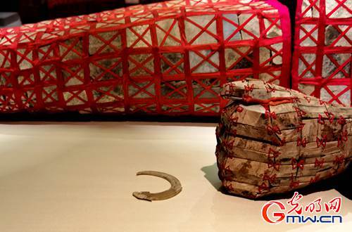 对襟款式、丝线编缀，揭秘两千多年前南越王丝缕玉衣之谜