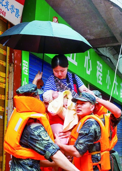 力保安澜 人民至上——抗洪精神述评 力保安澜 人民至上——抗洪精神述评