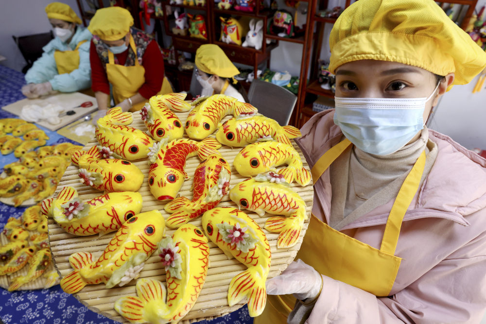 新华全媒+|年货摞出热气腾腾中国年