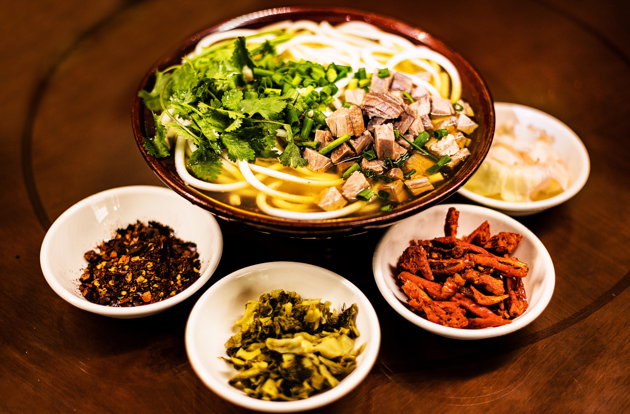 1709746164463736.jpg 吃穿不愁:黔西牛肉粉不但美味,更带着大家过上了好日子。燕江涛 摄.jpg