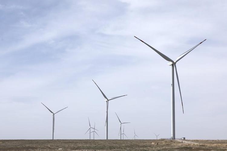 This photo taken on April 3, 2023 shows some wind turbine generators of the 100-MW Zhanatas wind farm in Zhanatas, Kazakhstan. (Photo by Kalizhan Ospanov/Xinhua)