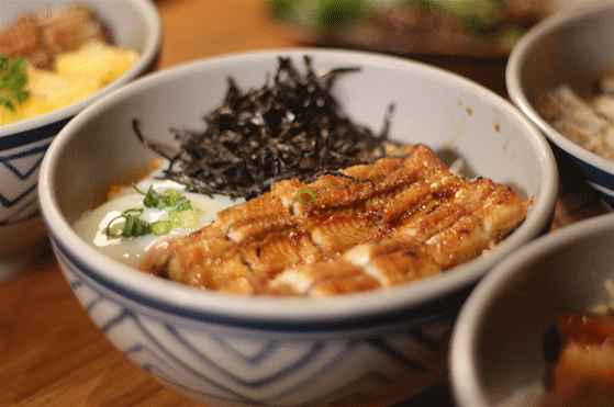 广东佛山顺德，鳗鱼以美食的姿态，沿着年产值数十亿元的全球产业链“游”向世界。图源：顺德发布