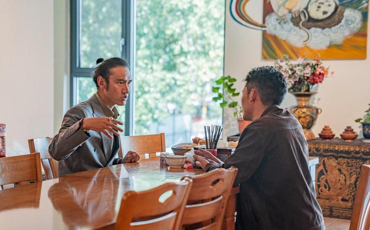 Tashi Badan (L) discusses the product design plan with a friend at Yakhore Design Company in Lhasa, southwest China's Xizang Autonomous Region, Sept. 16, 2025. (Xinhua/Tenzin Nyida)
