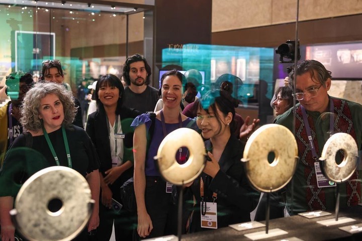 Guests attending the third UNESCO High-Level Forum for Museums visit the Liangzhu Museum in Hangzhou, east China's Zhejiang Province, on April 23, 2025. (Xinhua/Jiang Han)
