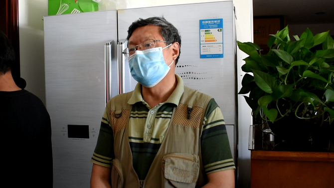 换上天然气,市民周师傅很开心。 换上天然气,市民周师傅很开心。